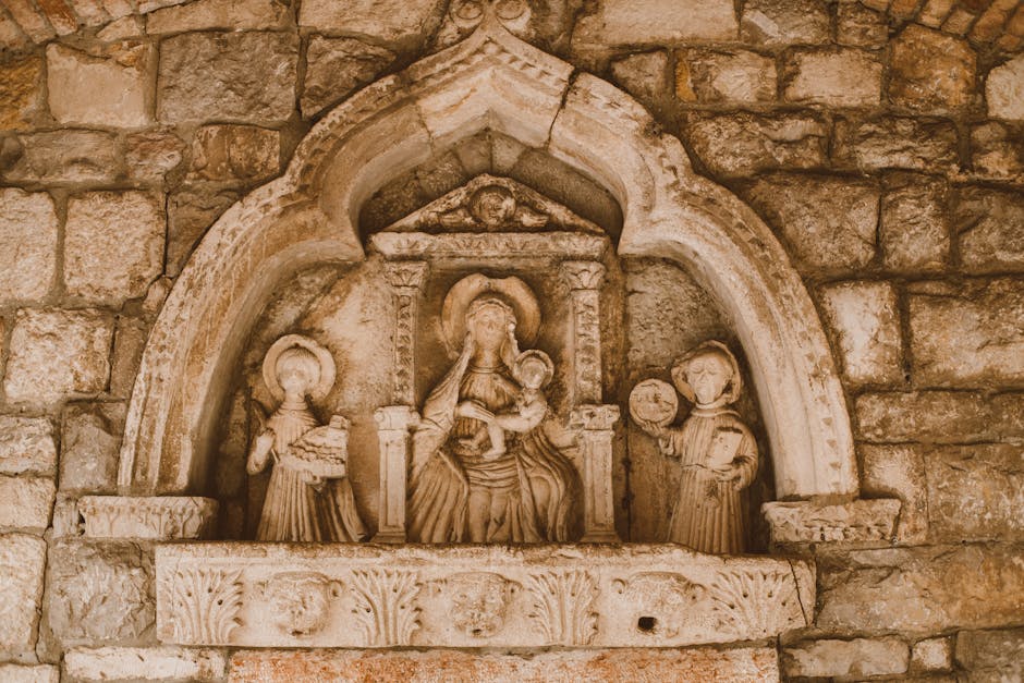 rome church stone portal sculpted figures detail