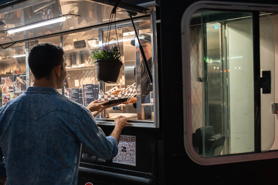 night street vendor hands serving food