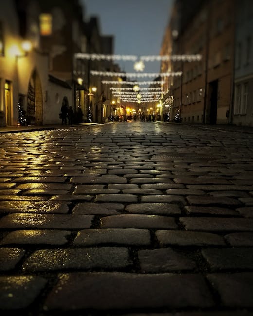 trastevere wet cobblestones lantern puddle reflection