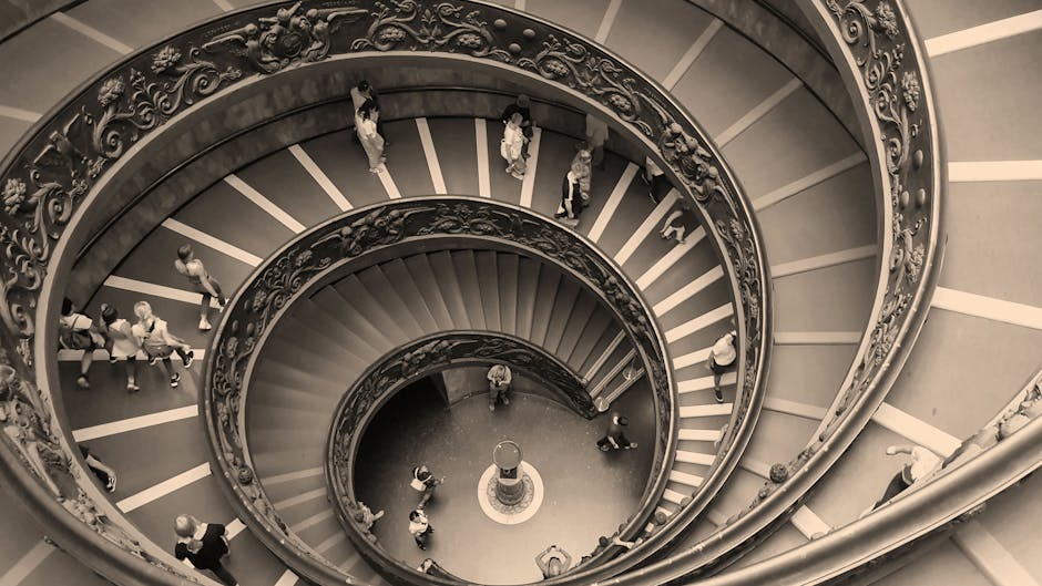 vatican museums spiral staircase under nighttime glow