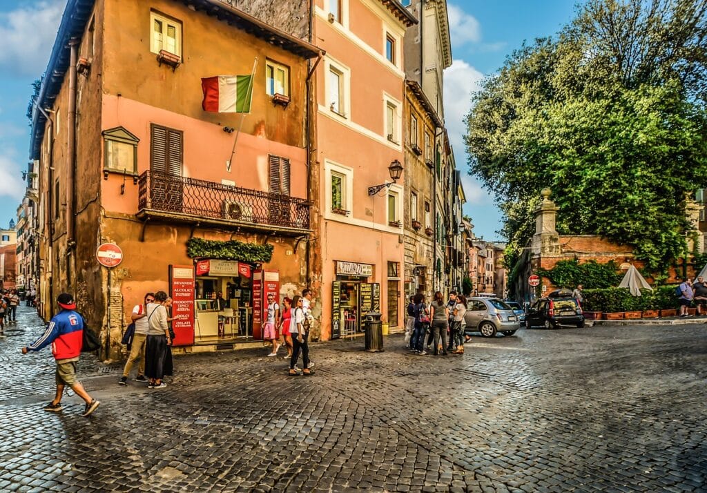 trastevere piazza evening string lights and facades