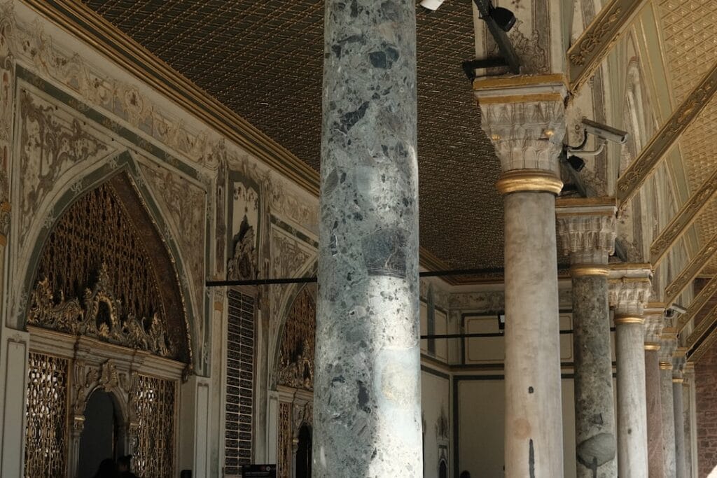 Marble column and shadow detail in a Roman basilica